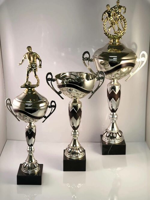 Examples of different statuette cup trophies available for customization at APS.