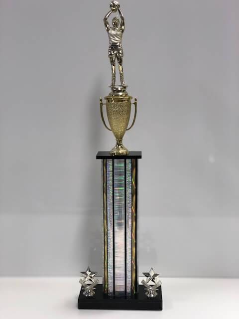 A basketball trophy with a player shooting a free throw at the top.