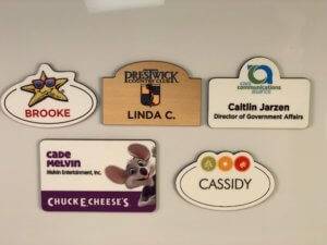 Five styles of phenolic name badges offered from APS.